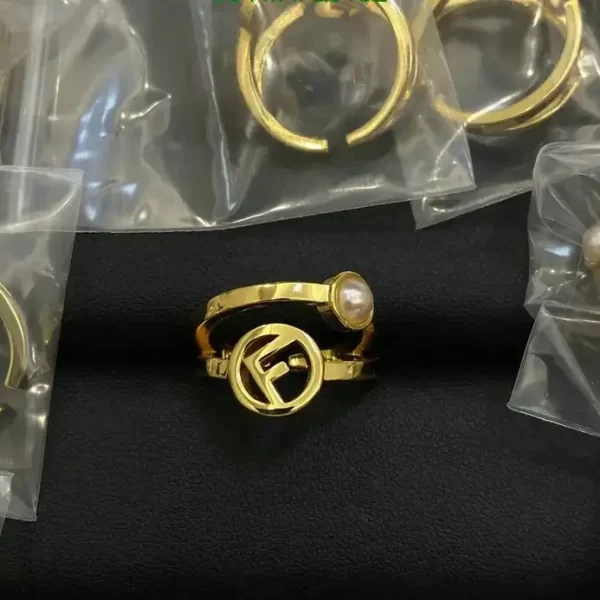 Fendi F is Fendi Crystal Logo Gold Tone Pearl Ring